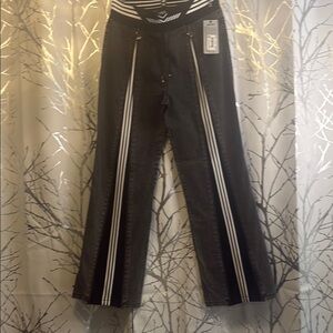 Black Wide Leg Flare Jeans with front zipper along each leg.